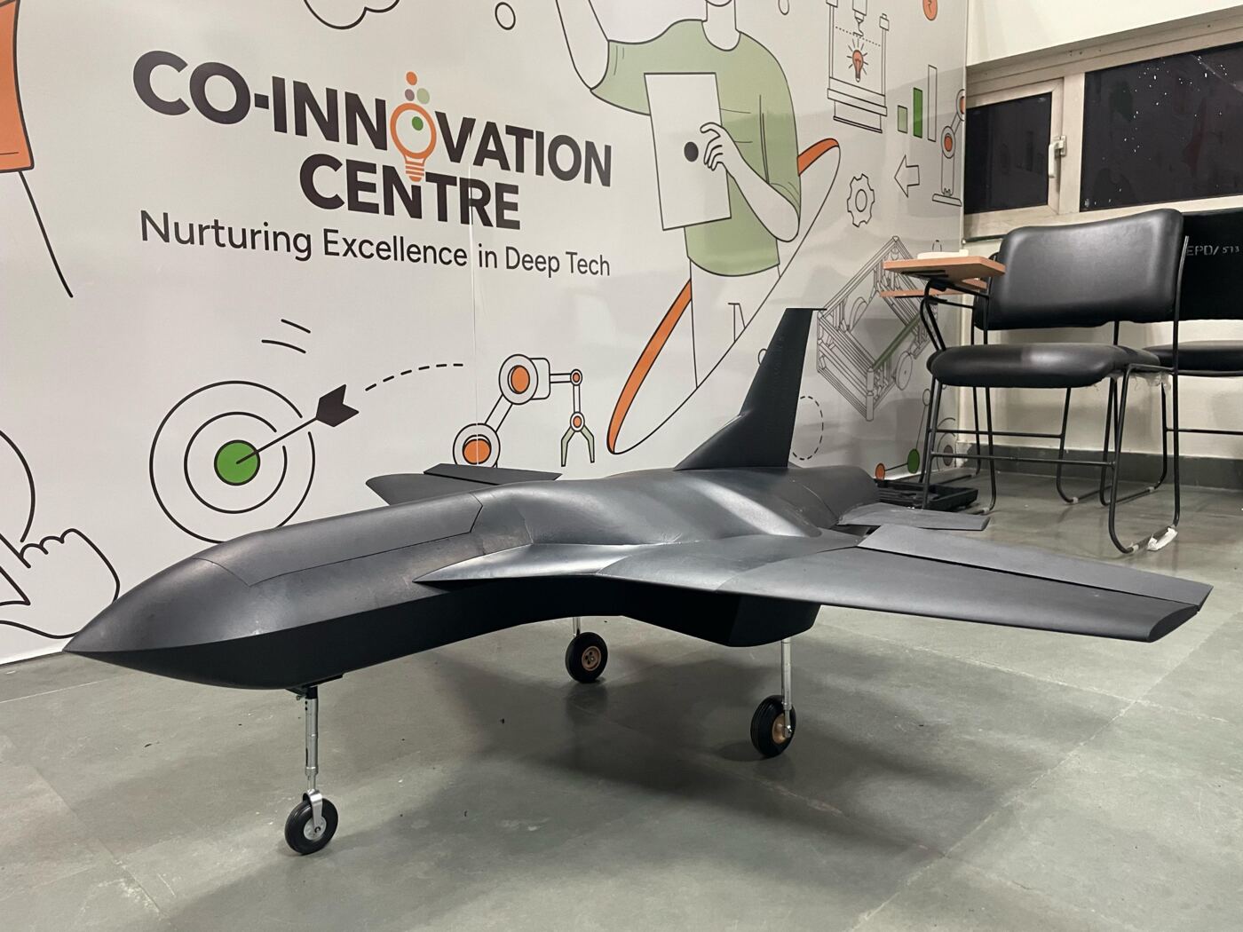 Fixed-wing UAV on its landing gear at the Co-Innovation Centre